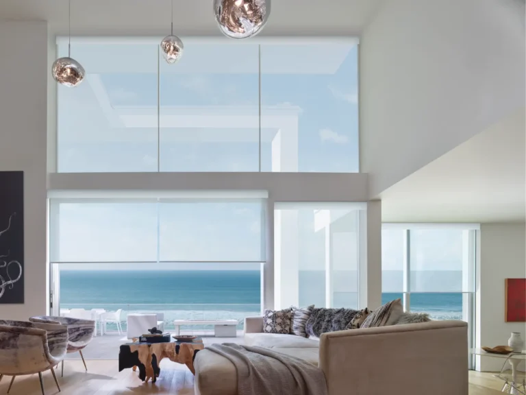 Floor to ceiling designer screen shades providing uv protection while not disrupting view