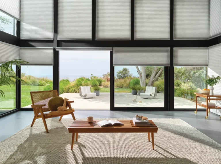 Duette Motorized PowerView Hunter Douglas Shades in Living Room and Sliding Door providing energy efficiency