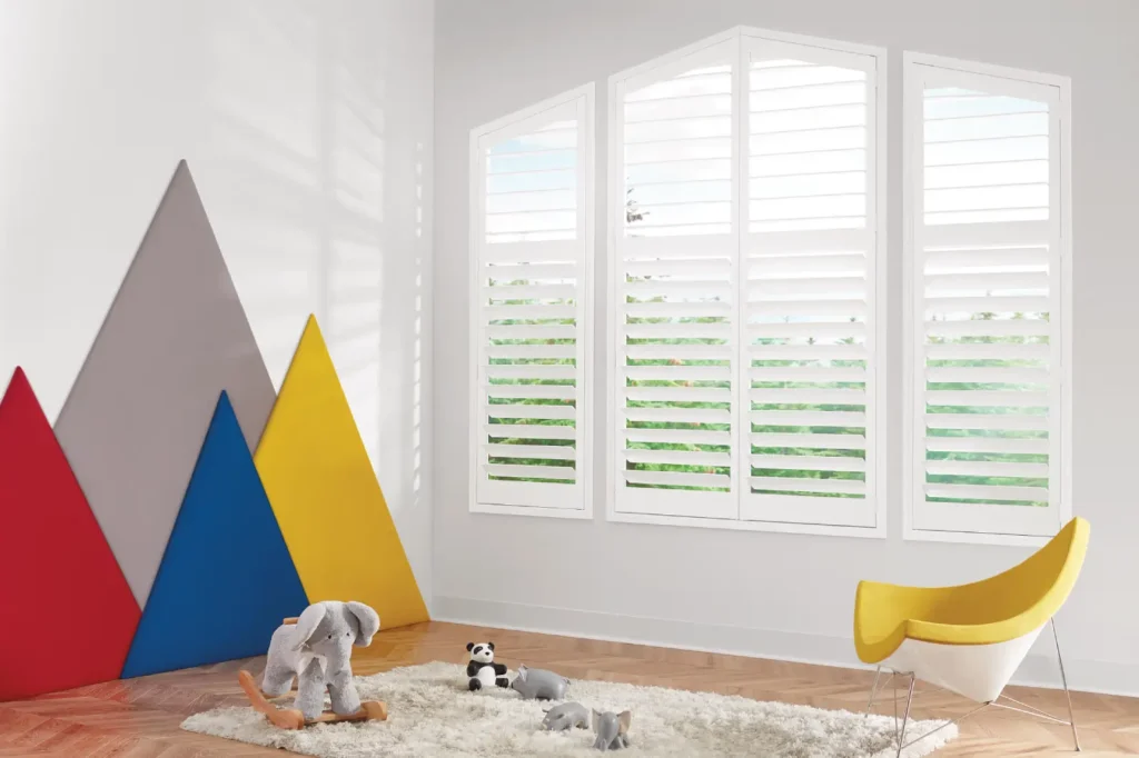 Hunter douglas new style shutters with hidden tilt and Divider rails available through ambassador blind n shutter in grand junction colorado