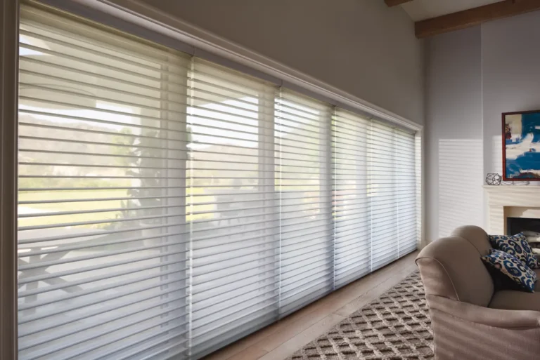 Several Hunter Douglas Silhouette sheer shades in open position available through Ambassador Blind in Shutter