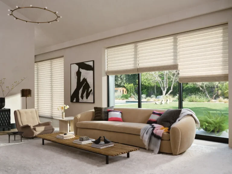 Hunter Douglas Vignette roman shades in living room at various heights demonstrating bottom stacking