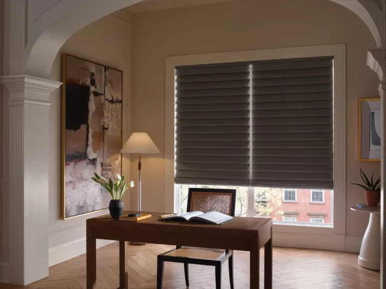 Room darkening motorized vignettes roman shades in an office available in grand junction colorado through Ambassador Blind N Shutter